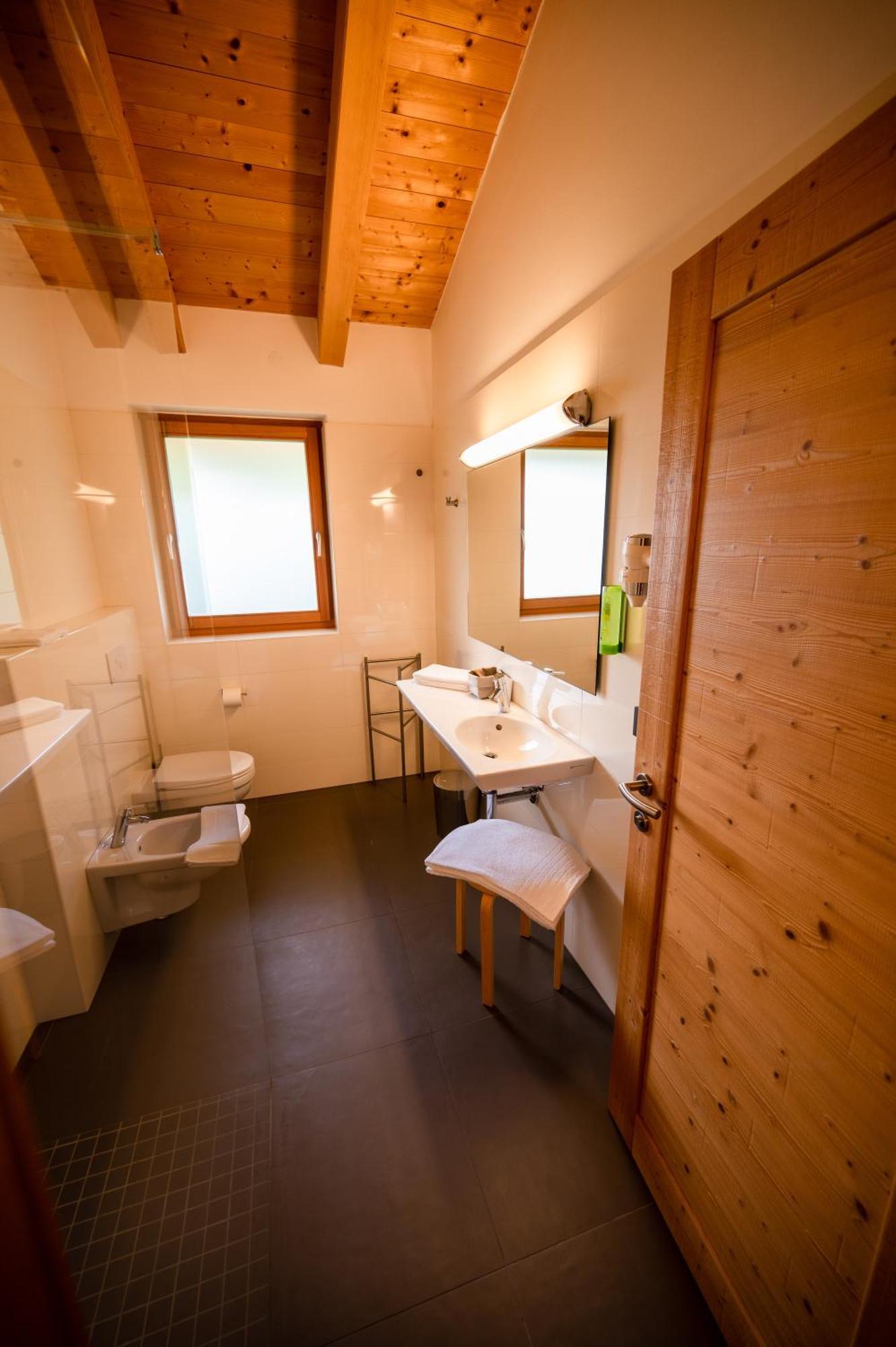 ホテル Garni Tuttotondo レーヴィコ・テルメ 部屋 写真